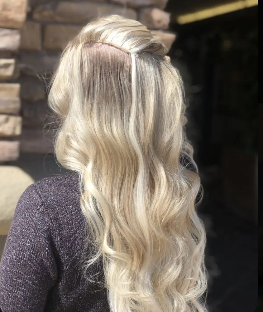 Long, seamless BELLAMI extensions blended for natural length and fullness