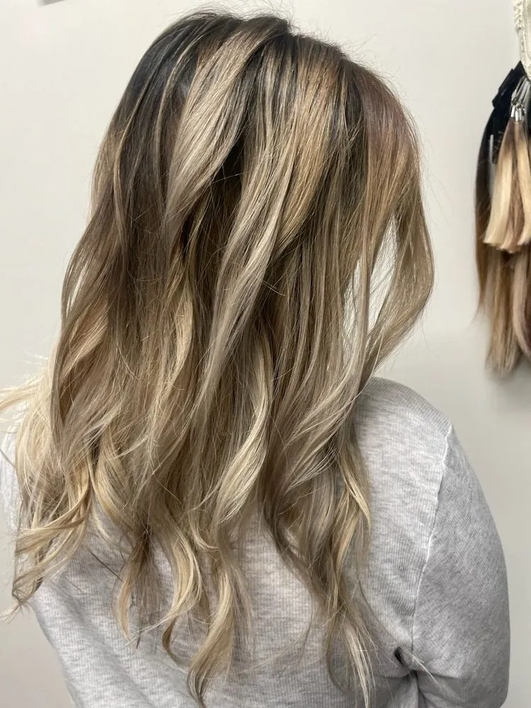 Face-framing balayage result by Valla at The Beauty Suite.
