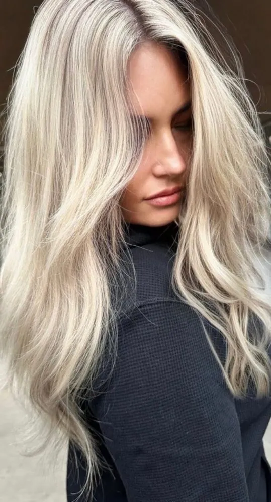 A bright, dimensional champagne-blonde result — the kind of finish created one client at a time at The Beauty Suite.