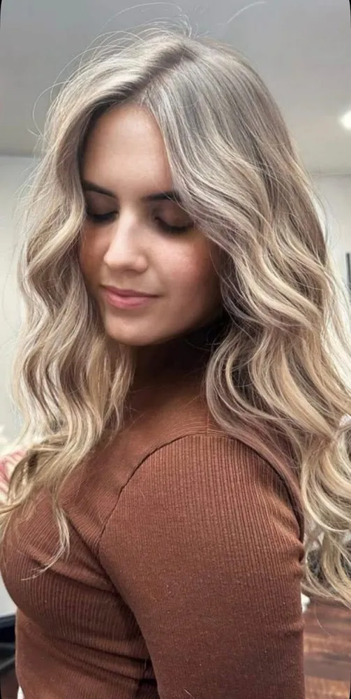 Champagne-blonde dimensional color result — the kind of finish Valla creates one client at a time at The Beauty Suite.